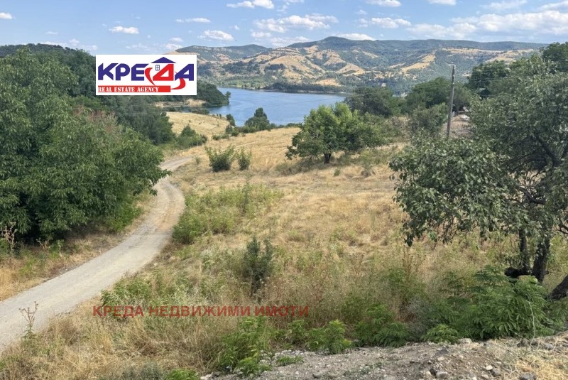 Продава ПАРЦЕЛ в област Кърджали, с. Гняздово - 916 кв.м / При запитване, КРЕДА НЕДВИЖИМИ ИМОТИ